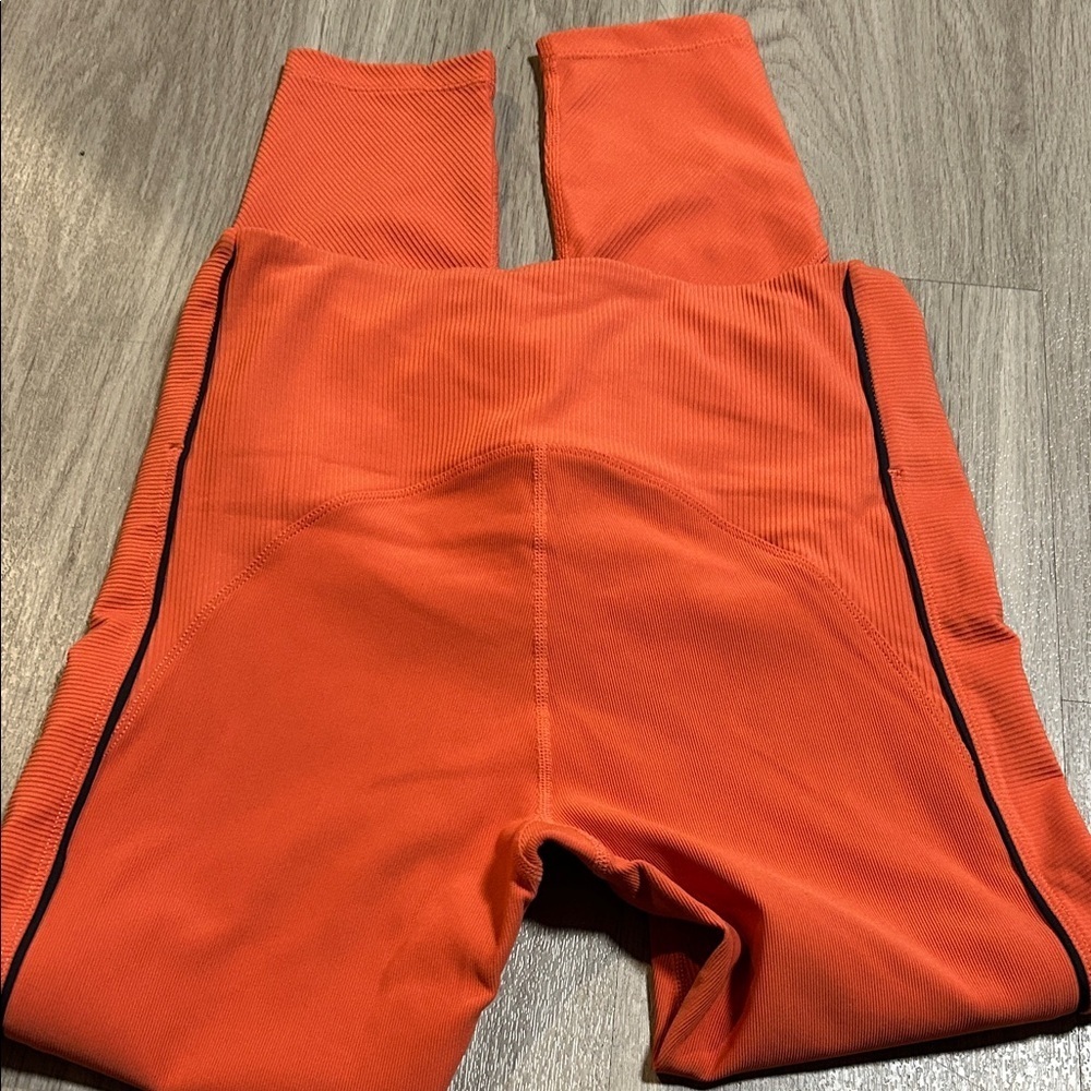 Stylish Orange Leggings with Black Trim - Picture 6 of 10